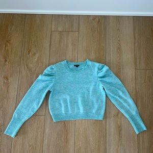 light blue sweater, size medium